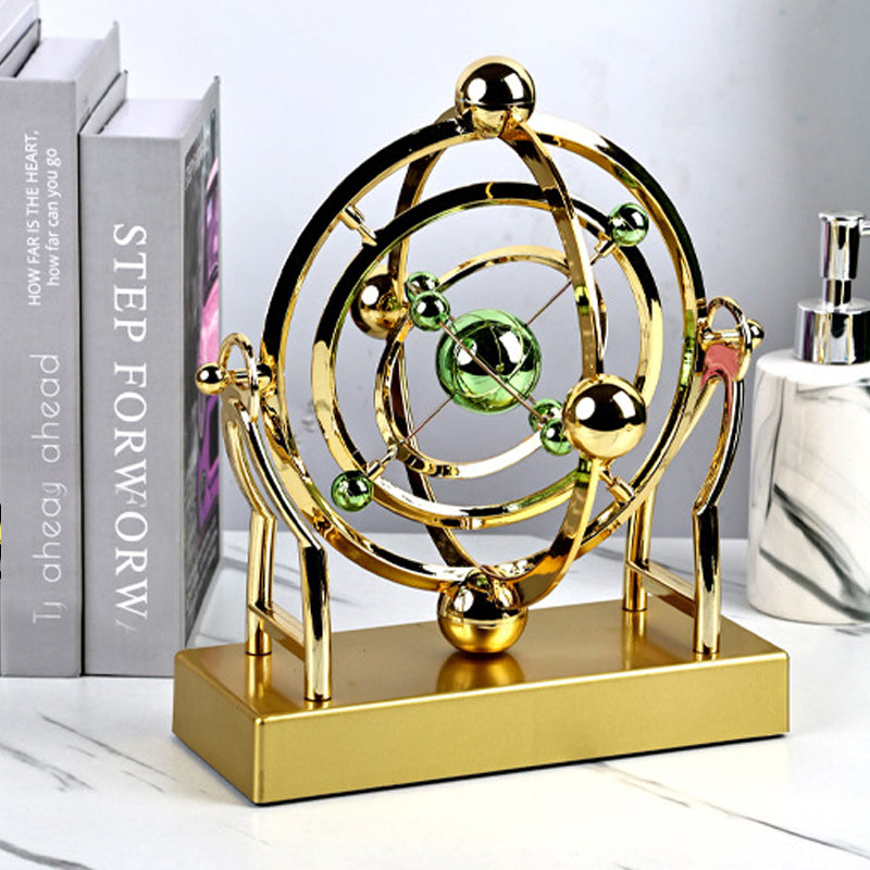 Orbitum Decorative Sculpture | Rotating Perpetual Motion | Science & Design in Motion | Metal