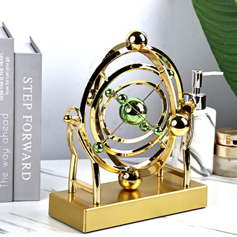 Orbitum Decorative Sculpture | Rotating Perpetual Motion | Science & Design in Motion | Metal